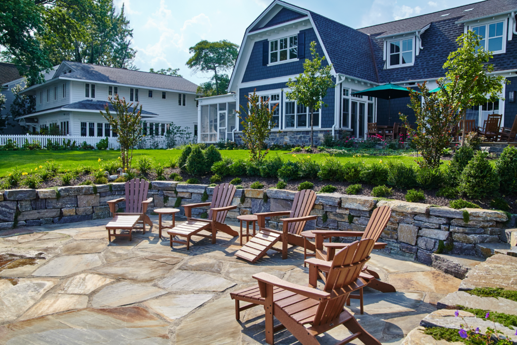 A stunning outdoor patio featuring intricate flagstone designs, showcasing custom patio installation in Thousand Oaks by one of the leading patio companies in the area.