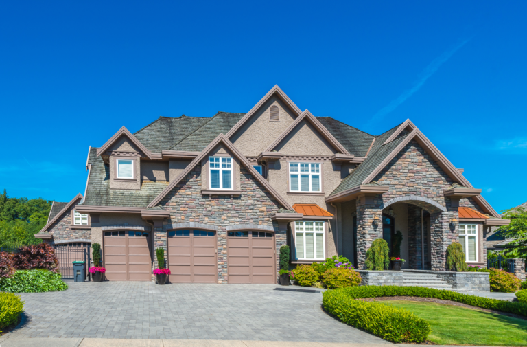 A beautiful home with a paved driveway, showcasing the expertise of concrete contractors in Calabasas. Specializing in driveway construction and paved driveway installation, these professionals are also skilled in paver installation, enhancing the curb appeal of homes in the area.
