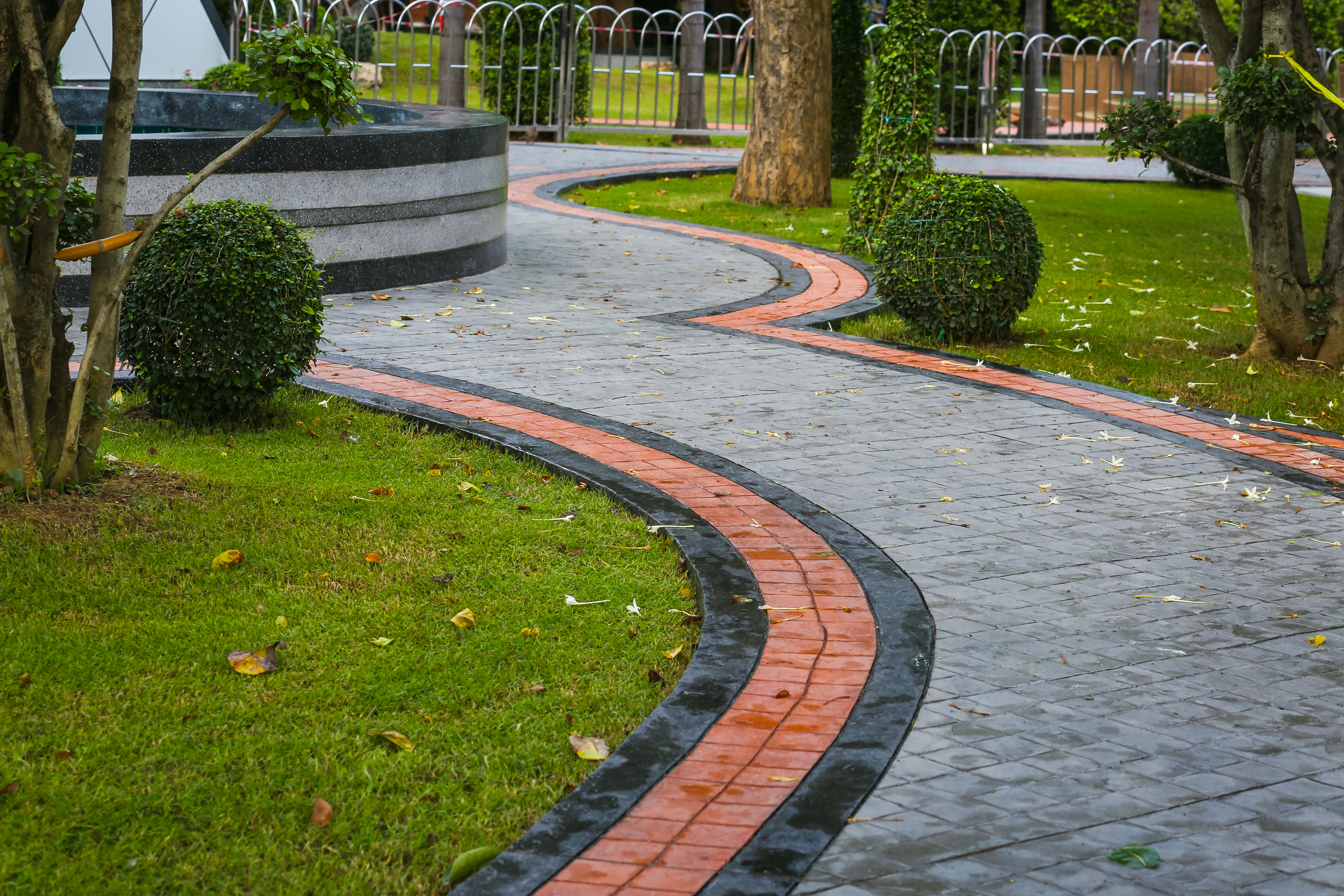 Image showing a stamped concrete sidewalk and walkway installed by a concrete contractor.