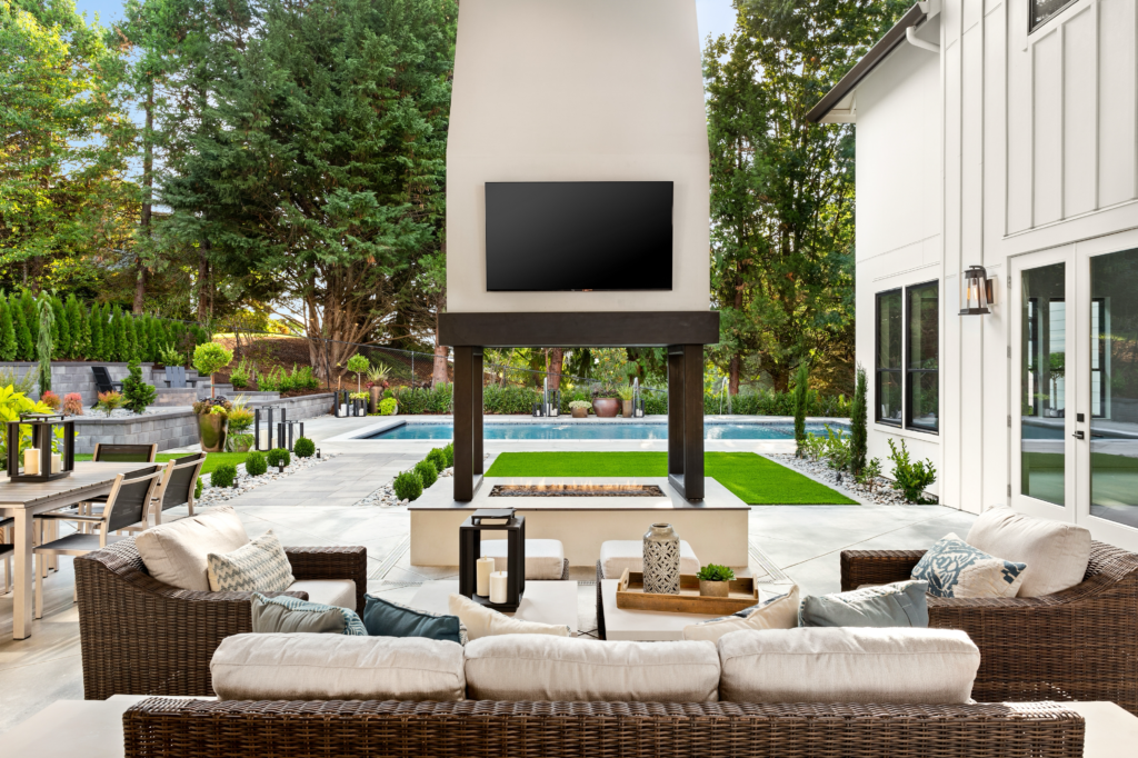Image showcasing a stunning backyard patio with modern furniture.