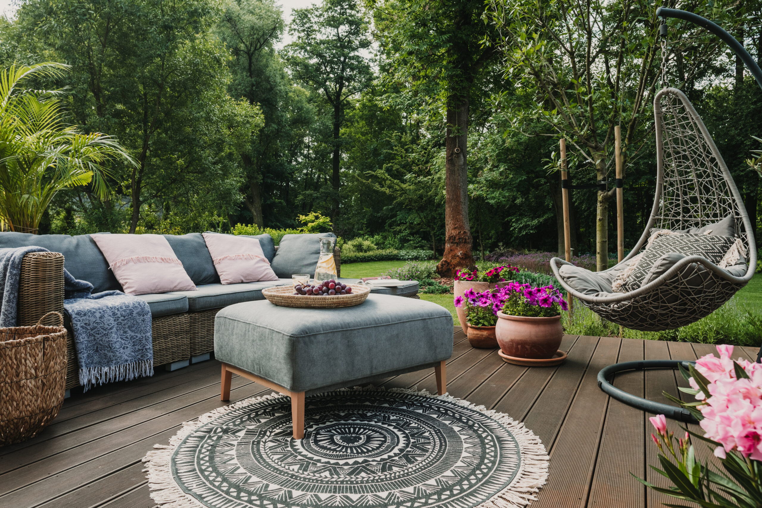 Image showcasing comfortable outdoor furniture in a backyard.