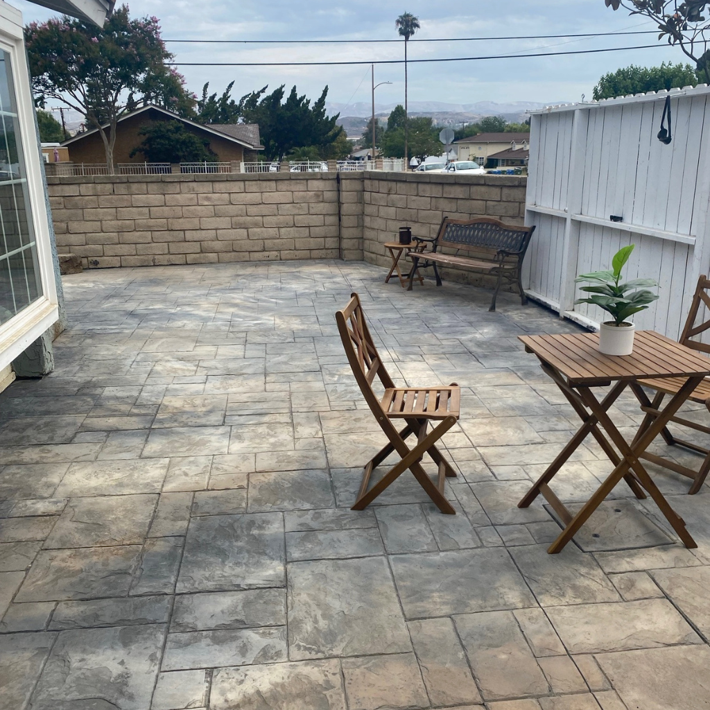 Image showcasing a stunning stamped concrete porch with an ashlar design stamp.